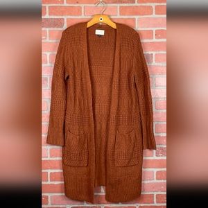 Orange rust colored SWEATER